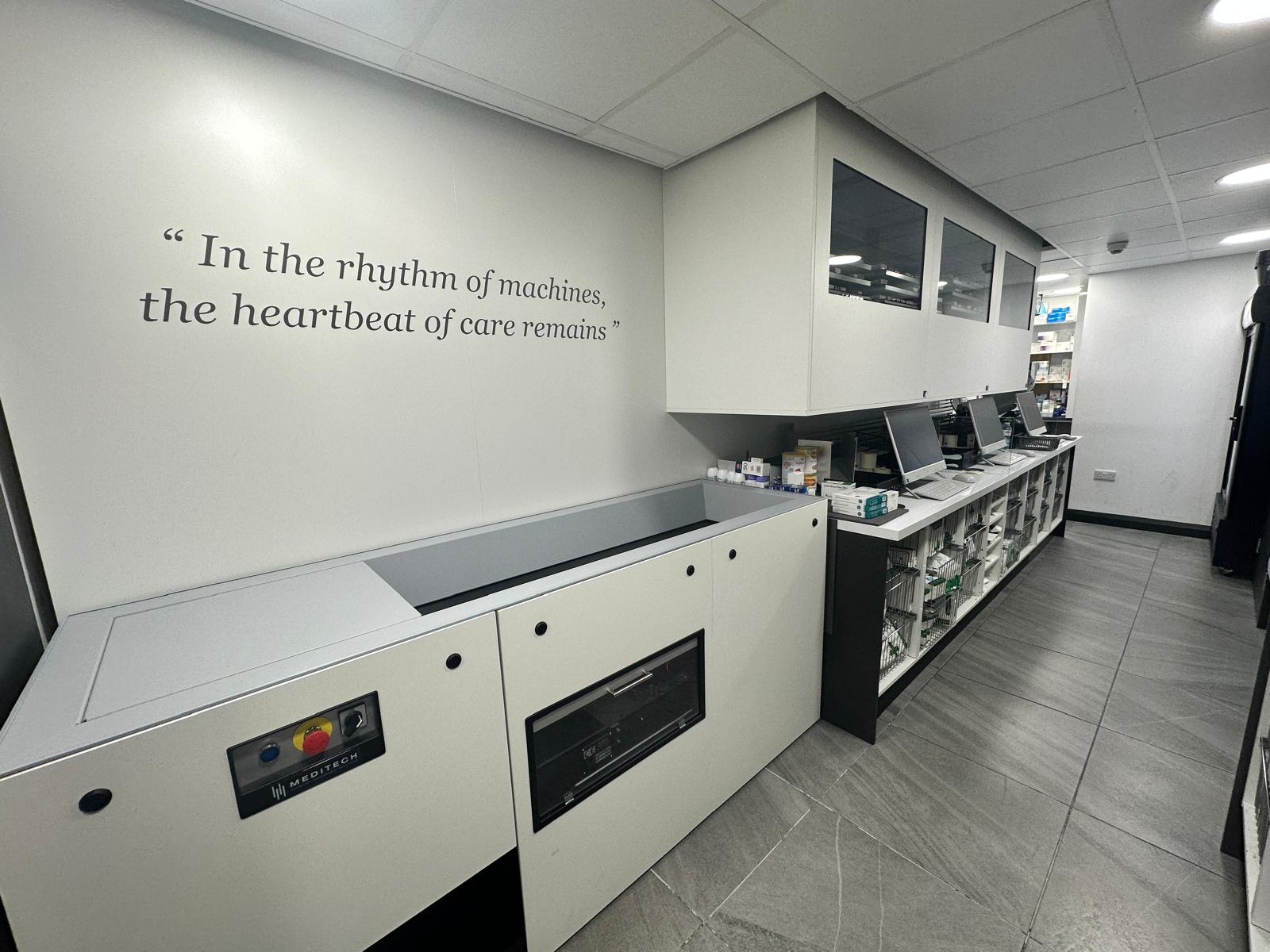 Automated dispensing robot storing and retrieving prescriptions at Carlton Pharmacy